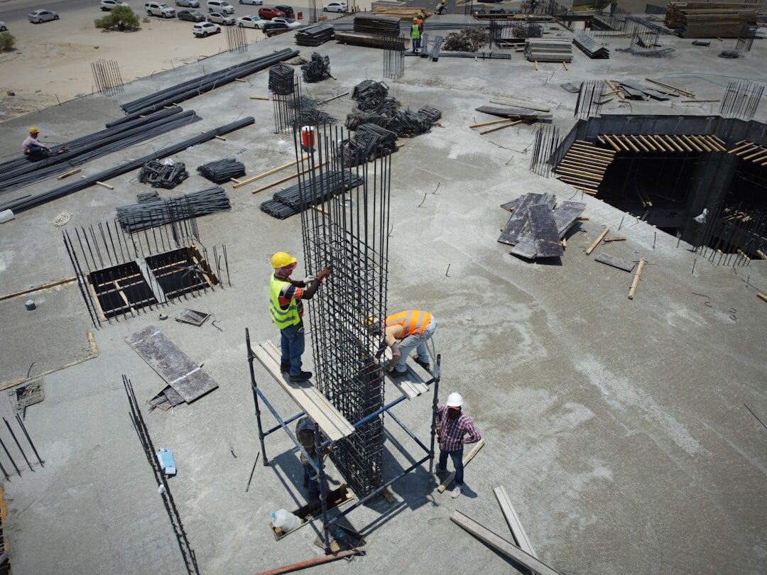 Workers reviewing safety instructions on site